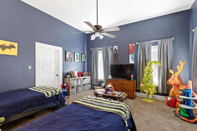 carpeted bedroom featuring a ceiling fan