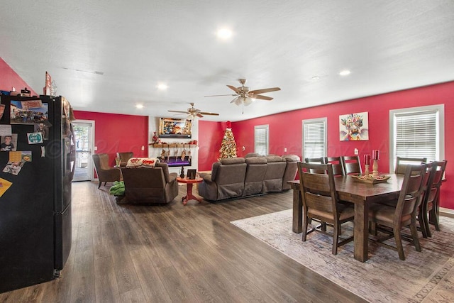 dining space featuring a ceiling fan, recessed lighting, and dark wood-style flooring