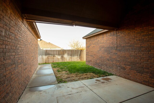 8620 Cortona Dr, Amarillo, TX 79119 - view of yard featuring a patio