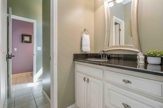 bathroom featuring vanity and tile patterned flooring