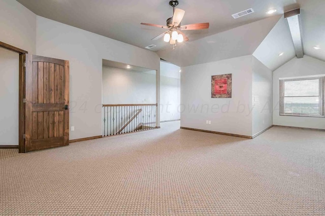 bonus room with ceiling fan, lofted ceiling with beams, and carpet