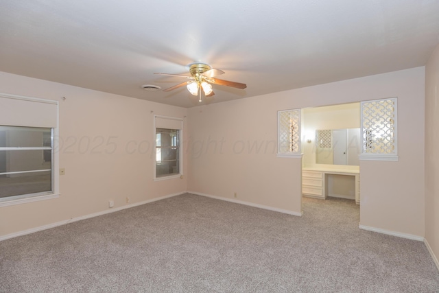 6710 Gainsborough Rd, Amarillo, TX 79106 - spare room featuring ceiling fan and carpet