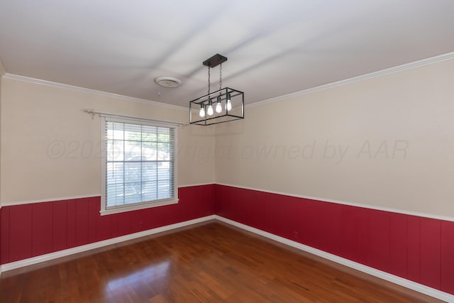 6710 Gainsborough Rd, Amarillo, TX 79106 - spare room with wood finished floors, wainscoting, and crown molding