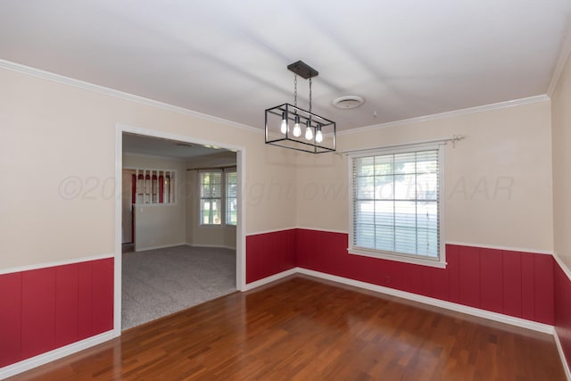 6710 Gainsborough Rd, Amarillo, TX 79106 - spare room featuring wainscoting, wood finished floors, ornamental molding, and a chandelier
