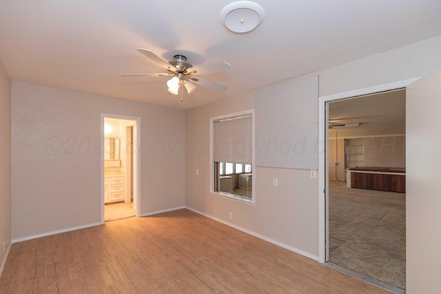 6710 Gainsborough Rd, Amarillo, TX 79106 - unfurnished room with ceiling fan and light wood-type flooring