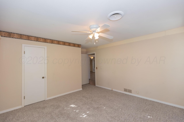 6710 Gainsborough Rd, Amarillo, TX 79106 - unfurnished room featuring a ceiling fan and light carpet