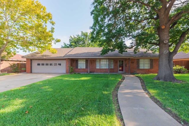 6710 Gainsborough Rd, Amarillo, TX 79106 - ranch-style home featuring brick siding, a garage, and driveway