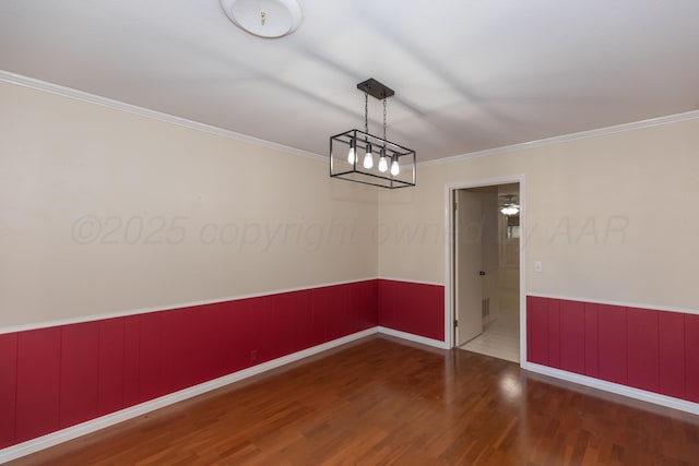 6710 Gainsborough Rd, Amarillo, TX 79106 - unfurnished dining area with wood finished floors, wainscoting, and crown molding
