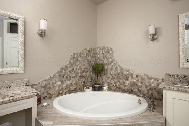 5708 Wesley Rd, Amarillo, TX 79119 - bathroom featuring vanity and a bath