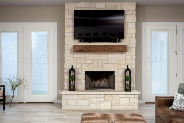 5708 Wesley Rd, Amarillo, TX 79119 - living area featuring a fireplace and wood finished floors