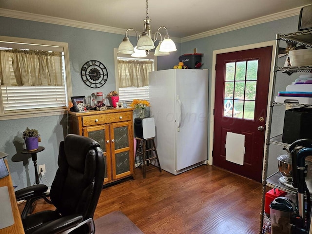 home office with crown molding and wood finished floors