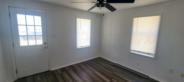 entryway with ceiling fan and dark hardwood / wood-style flooring