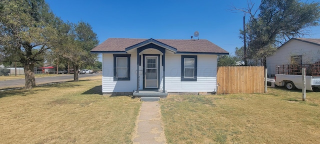 bungalow with a front lawn