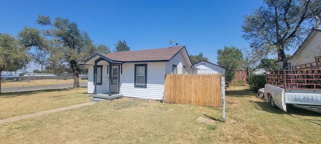 view of front of house with a front lawn