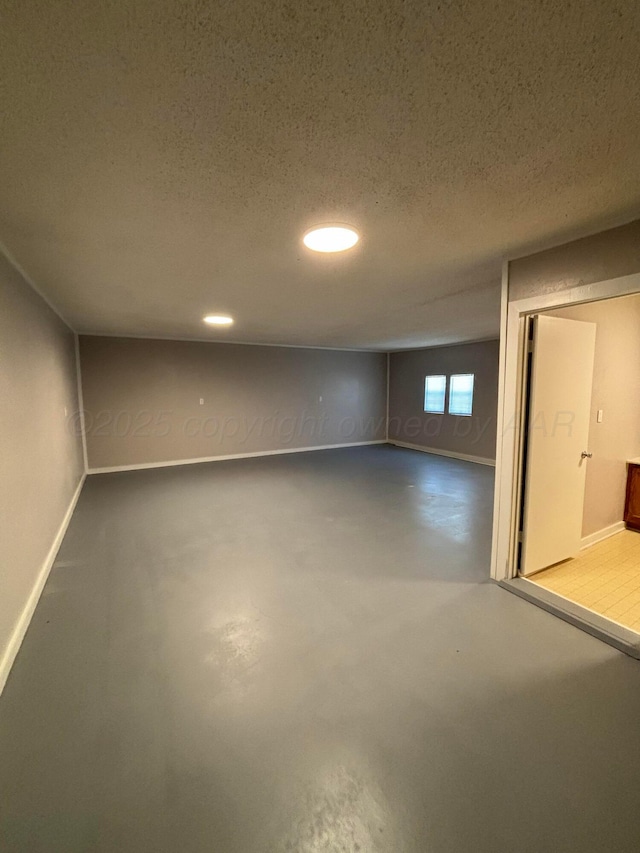 basement with a textured ceiling