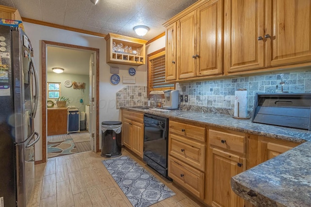 kitchen with freestanding refrigerator, black dishwasher, tasteful backsplash, light wood-style floors, and ornamental molding