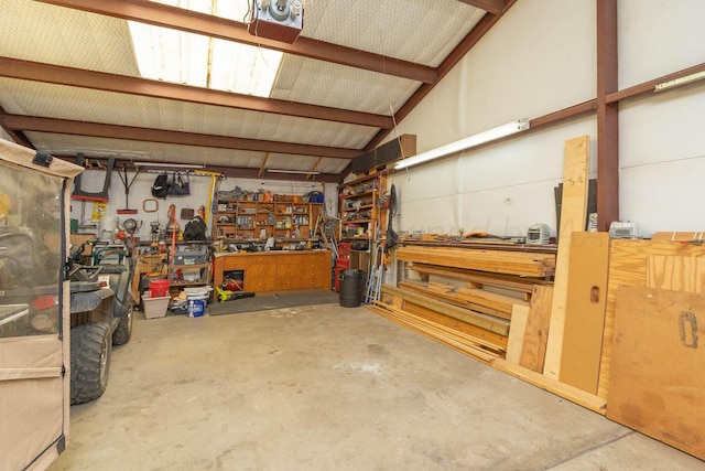 garage featuring a workshop area and a garage door opener