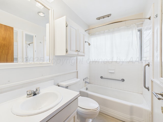 full bath featuring vanity, shower / tub combination, and toilet