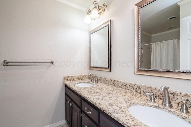 bathroom with double vanity, visible vents, ornamental molding, and a sink