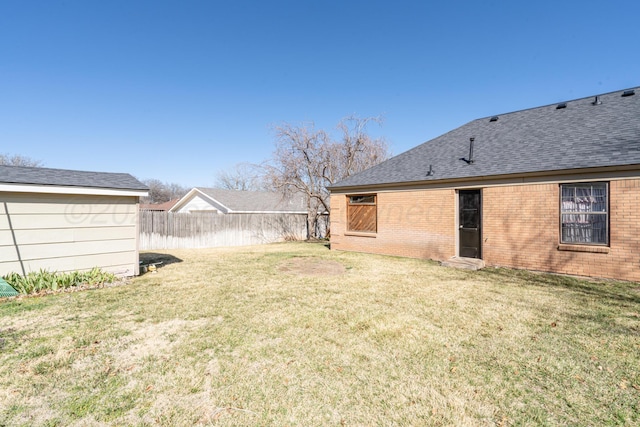 view of yard featuring fence