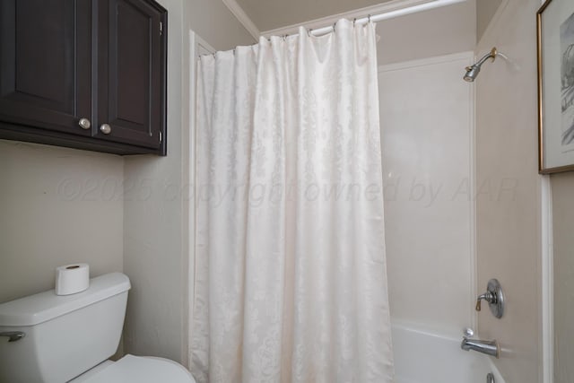 bathroom with toilet and shower / tub combo with curtain