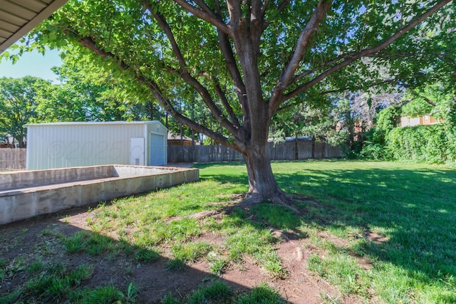 5404 While A Way Rd, Amarillo, TX 79109 - view of yard featuring an outdoor structure and a detached garage