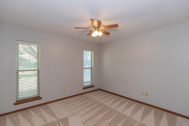 5404 While A Way Rd, Amarillo, TX 79109 - empty room with a ceiling fan, baseboards, and light carpet