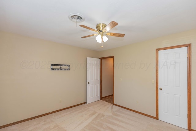 5404 While A Way Rd, Amarillo, TX 79109 - unfurnished bedroom with baseboards, light colored carpet, and a ceiling fan