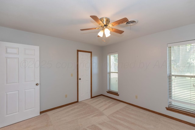 5404 While A Way Rd, Amarillo, TX 79109 - empty room with baseboards, a ceiling fan, and light colored carpet