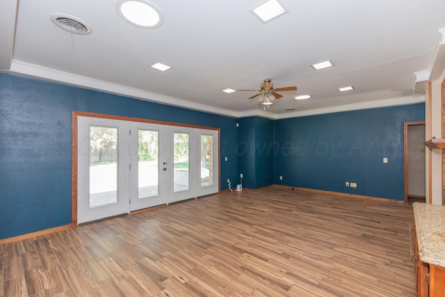 5404 While A Way Rd, Amarillo, TX 79109 - unfurnished room with wood finished floors, ornamental molding, ceiling fan, and baseboards