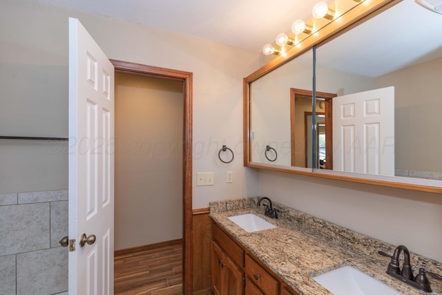 5404 While A Way Rd, Amarillo, TX 79109 - full bath featuring double vanity and wood finished floors