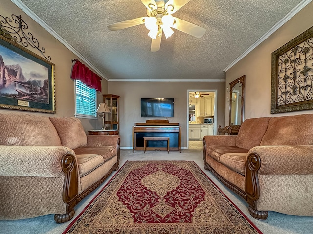 carpeted living room with ceiling fan, ornamental molding, and a textured ceiling