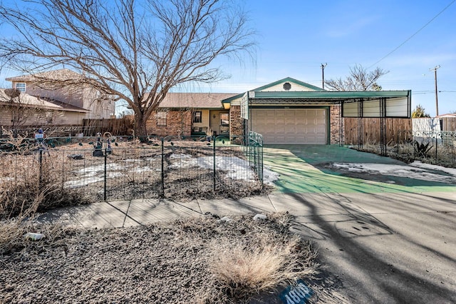 ranch-style home featuring a garage