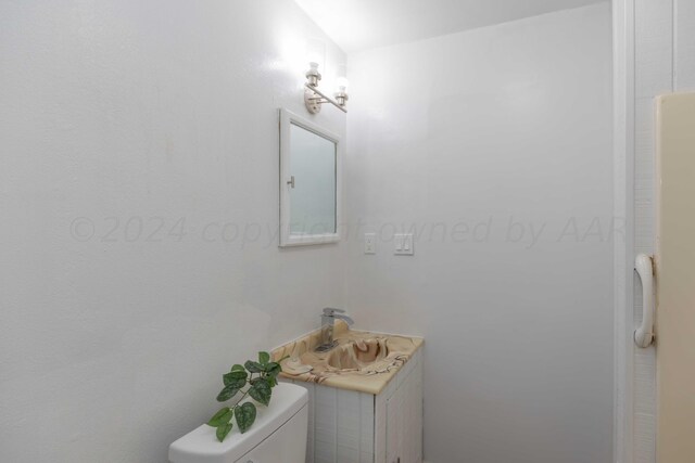 bathroom featuring sink and toilet