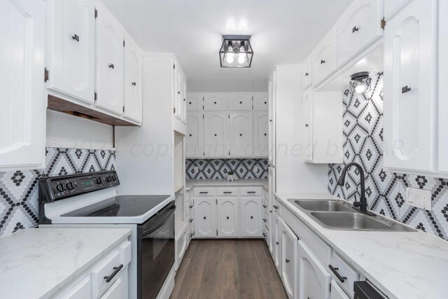 kitchen with white cabinetry, sink, range with electric cooktop, dark hardwood / wood-style flooring, and decorative backsplash