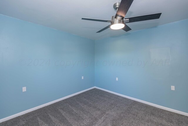 carpeted empty room with ceiling fan