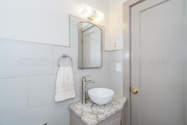 2523 5th Ave, Canyon, TX 79015 - bathroom featuring vanity and decorative backsplash