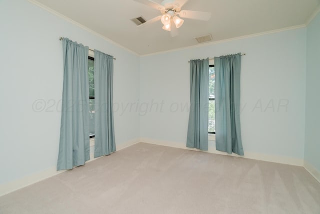 2523 5th Ave, Canyon, TX 79015 - carpeted spare room featuring plenty of natural light, crown molding, baseboards, and a ceiling fan