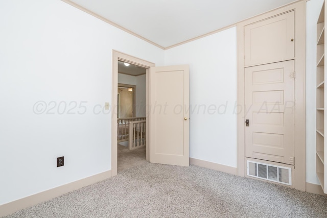 2523 5th Ave, Canyon, TX 79015 - carpeted spare room featuring ornamental molding