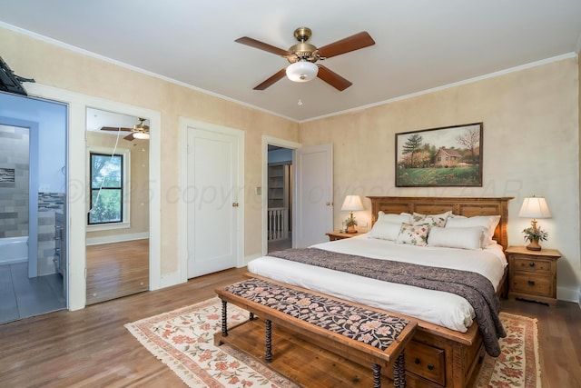 2523 5th Ave, Canyon, TX 79015 - bedroom featuring wood finished floors, crown molding, ceiling fan, and baseboards