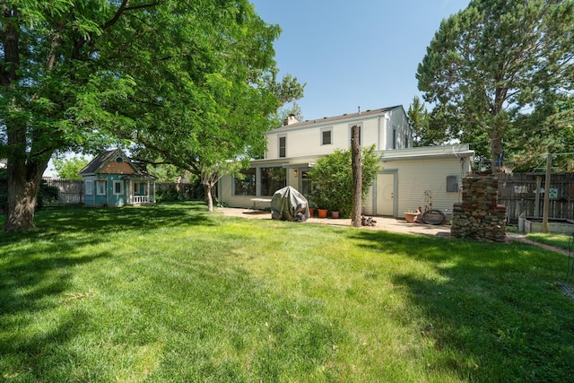 2523 5th Ave, Canyon, TX 79015 - view of yard featuring a patio and an outbuilding