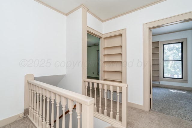 2523 5th Ave, Canyon, TX 79015 - corridor featuring an upstairs landing, carpet flooring, crown molding, and baseboards