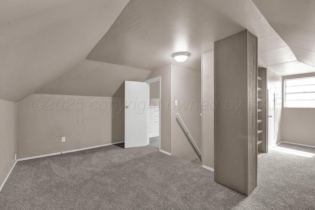 1610 N Hayes St, Amarillo, TX 79107 - bonus room featuring carpet flooring, baseboards, and lofted ceiling