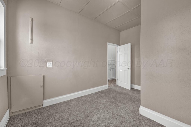 1610 N Hayes St, Amarillo, TX 79107 - empty room featuring carpet and baseboards