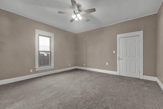 1610 N Hayes St, Amarillo, TX 79107 - empty room featuring baseboards, a ceiling fan, and carpet floors