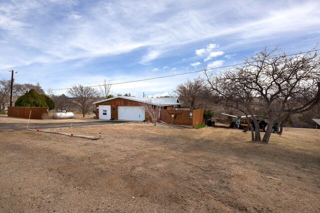 view of yard featuring a garage