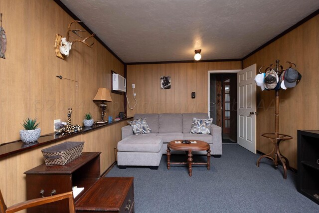 living room featuring wood walls, crown molding, and dark carpet