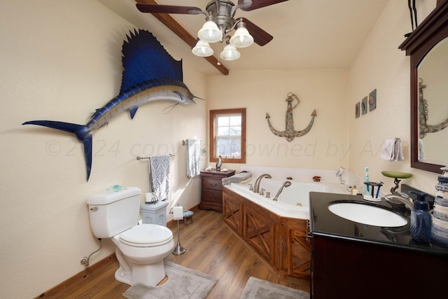 bathroom featuring wood-type flooring, vanity, toilet, a tub to relax in, and ceiling fan