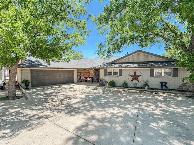 120 Port O Call Dr, Amarillo, TX 79118 - ranch-style home with brick siding, a garage, and concrete driveway
