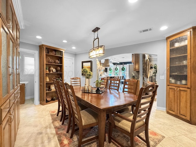 120 Port O Call Dr, Amarillo, TX 79118 - dining area with ornamental molding, arched walkways, light tile patterned flooring, recessed lighting, and plenty of natural light